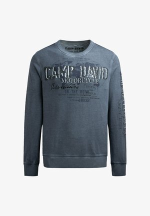 Dunkelblaues Sweatshirt mit langen Ärmeln, gerippten Bündchen und Halsausschnitt. Verfügt über bedruckten Text und Grafiken auf der Vorderseite und am Ärmel. Weicher Stoff.