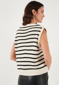 LELA LOOSE FIT - Mellény - ecru black