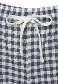 Marineblauwe en witte geruite shorts van een lichte stof, met een trekkoord in de taille en een gestructureerd oppervlak voor comfort.