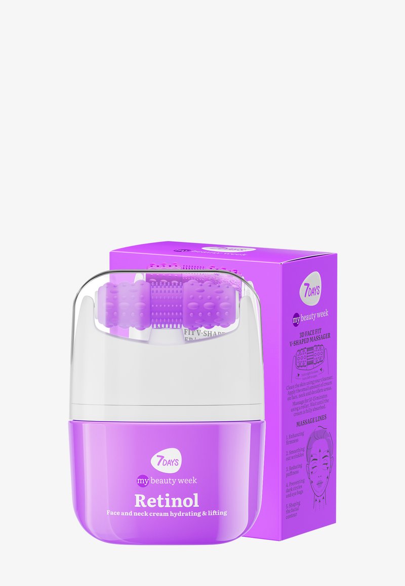 Masseur facial violet avec rouleaux texturés, dessus transparent et contenant violet. La boîte affiche "Rétinol" et les instructions d'utilisation, avec un schéma de couleurs assorti.
