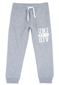 Grå mjukisbyxor i bomull med elastiskt midjeband och dragsko, samt texten "UNI T.F. 72 DIV" tryckt i vitt på sidan.