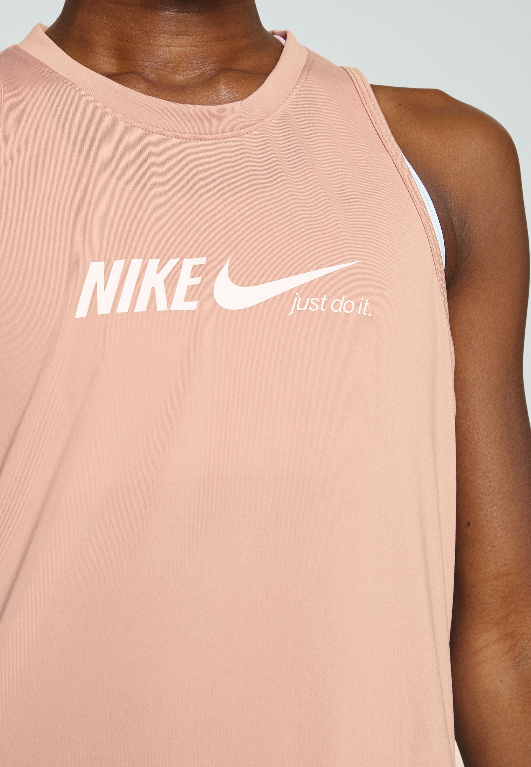 light pink nike tank top