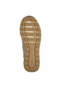 Semelle en caoutchouc de couleur beige, avec des motifs de grip texturés et des lignes de bande de roulement marquées pour une traction optimale. Présente un logo d'absorbeur de chocs.