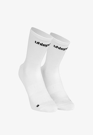 Pair of white mid-calf sports socks with black "uhlsport" logo near the top and textured knit pattern on foot and ankle areas.