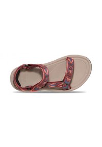 Sandalia deportiva con suela beige y correas de patrón multicolor. Cuenta con cierres ajustables y una plantilla texturizada para mayor agarre.
