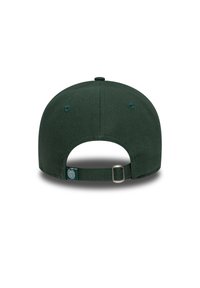 Green baseball cap featuring a textured fabric, adjustable strap at the back, and a circular logo patch near the strap.