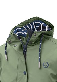 Green waterproof jacket with a zip and snap closure. Interior features a navy and white striped lining. Includes drawstring hood with metal accents.