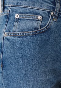NA-KD Tall Relaxed fit -farkut - light blue