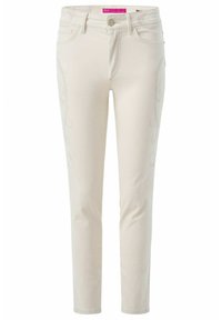 Beige jeans with a slim fit, made of denim. Features embroidered swirls on the sides and a standard waistband with a zipper fly.