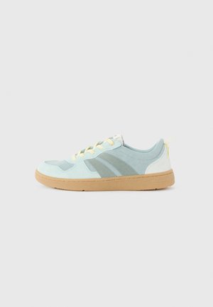 Light blue suede sneaker with curved design, beige rubber sole, yellow laces, and textured side stripes. Designed for casual wear.