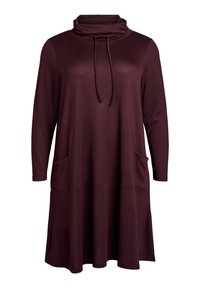 Burgundy pitkähihaine mekko, jossa on kaulus, nyörit yksityiskohtina, sivutaskut ja rento istuvuus, valmistettu pehmeästä, tekstuurista kankaasta.