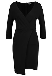 Black wrap dress made of stretchy fabric, featuring a deep V-neck, three-quarter sleeves, and an asymmetrical hemline with a back zipper.