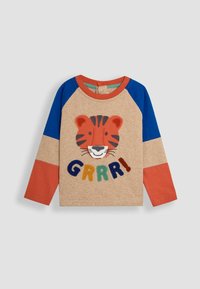 Pitkähihaisen t-paidan beige väri, jossa siniset ja oranssit raglan-hihat. Paidassa on aplikoitu tiikerin kasvot ja värikäs "GRRR!"-teksti.