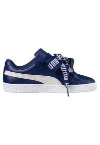 Royal blue sneakers with white leather accents and textured rubber soles; features prominent branded laces and a sleek, low-top design.