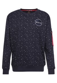 Felpa della marina con stampa a stelle, scollatura rotonda, polsini e orlo a costine. Presenta un logo NASA e una tasca con zip con un accento rosso.