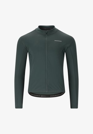 Dark green long-sleeve cycling jacket with a full front zipper, textured fabric, and black branded hem. Features a mock collar.