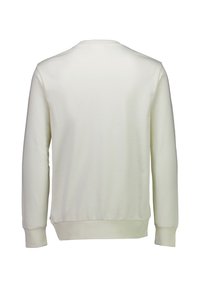 Cremefärgad sweatshirt med långa ärmar, rund halsringning och ribbad mudd och nederkant. Slät textur, enkel design, inga synliga logotyper eller mönster.