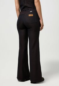 Wrangler Jeans a zampa - mahogany