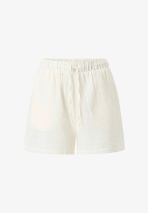 Shorts courts en coton blanc avec un tissu texturé et léger. Dotés d'une ceinture élastique avec un cordon de serrage pour un ajustement personnalisé.
