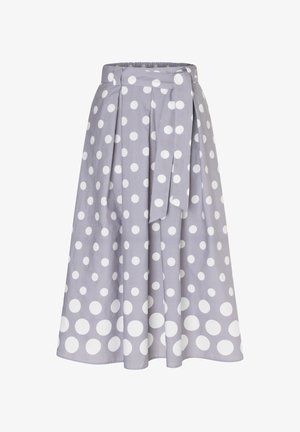 Grauer A-Linien-Rock mit weißen Punkten, plissiertem Design und passendem Stoffgürtel, der in der Taille gebunden ist.