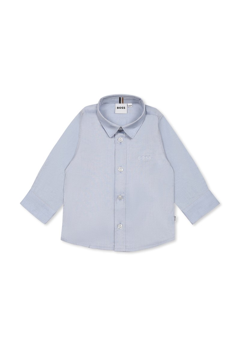 Light blue long-sleeve shirt made of cotton with a button front, collar, embroidered logo, and buttoned cuffs. Simple, smooth texture.