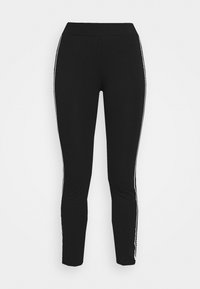 Leggings neri con vita alta, vestibilità affusolata e strisce laterali bianche per dettagli. Realizzati in un materiale morbido ed elastico.