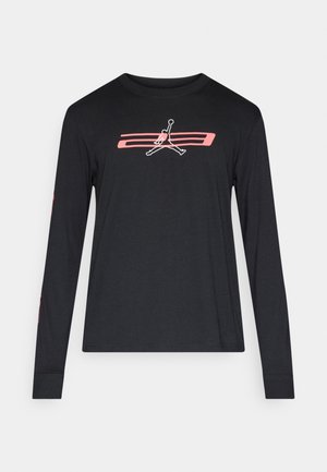 Čierne tričko s dlhým rukávom z bavlny, na hrudi s ružovo-bielym logom Jordan a ružovými akcentmi na rukávoch.