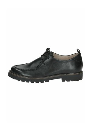 Scarpe in pelle nera con punta arrotondata, decorazioni cucite lungo la parte superiore e una robusta suola in gomma con grip strutturato.