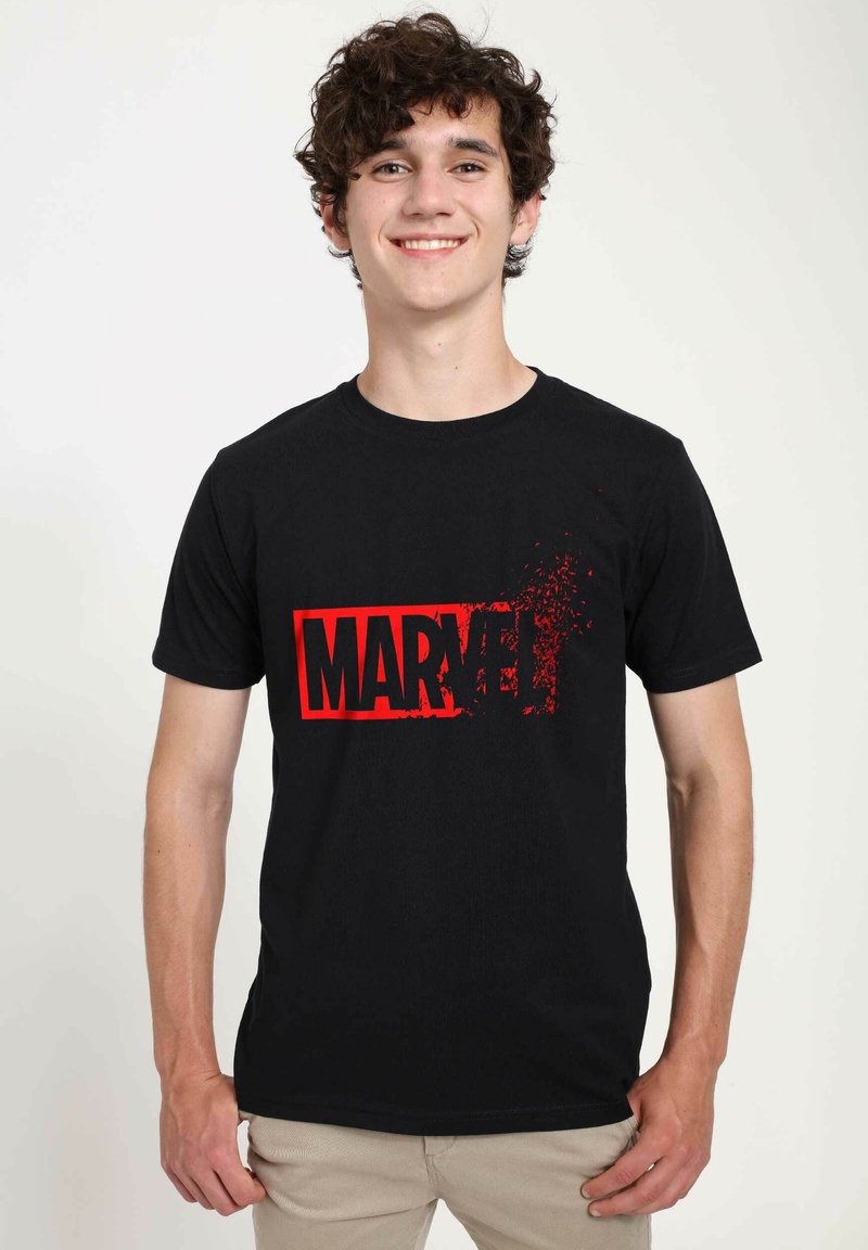 Black cotton t-shirt featuring a large red "MARVEL" logo with a distressed effect, short sleeves, and a crew neckline.