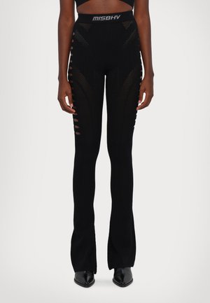 BIANCA SEAMLESS TROUSERS - Trousers - black