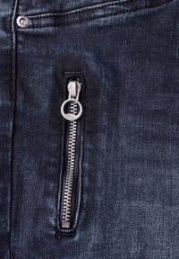 Denim fabric in dark blue, featuring a silver zipper with a round pull tab and stitching along the pocket edge.