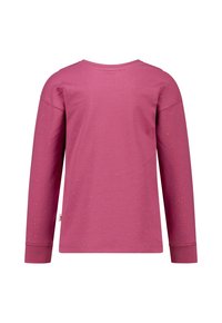Langsleeve shirt in een levendige roze kleur met een spikkelpatroon. Gemaakt van zachte stof, met een ronde hals en geribbelde manchetten.