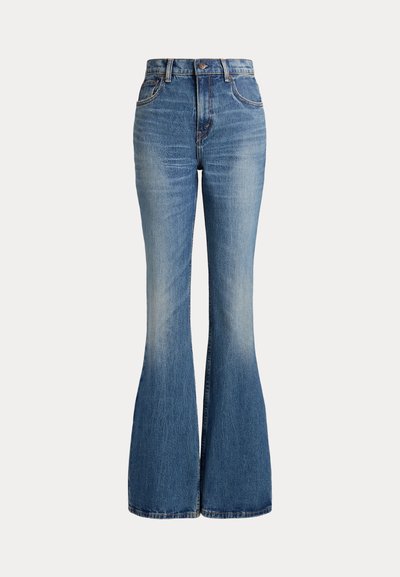 High-waisted blue denim jeans with flared legs and slight fading on front thigh area, shown against white background.