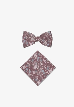 Nœud papillon et pochette assortie avec fond mauve et motif floral rose clair et bleu sur surface blanche.