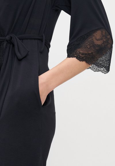 Black robe with lace-trimmed sleeves, adjustable tie belt, soft fabric, features two side pockets and a relaxed fit.