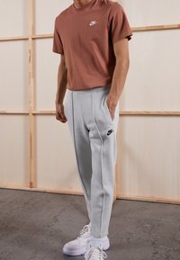 Nike Sportswear Träningsbyxor - silver-coloured