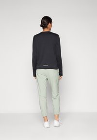 Nike Performance DRI-FIT FAST - Treniņtērpa apakšdaļas - jade horizon