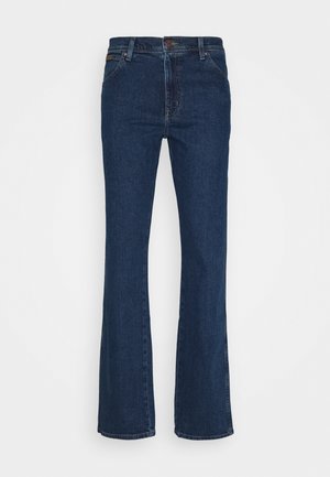 Dark blue denim flared jeans with a high waist, five-pocket design, and subtle stitching details. Smooth texture, standard belt loops.