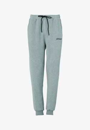 Pantalon de survêtement gris clair avec cordon noir, poignets élastiques, poches latérales et petit logo noir "uhlsport" sur la partie supérieure de la cuisse.