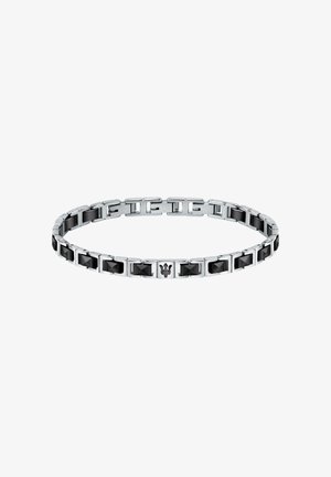 Sølvfarvet armbånd med skiftende kvadratiske sorte detaljer og glatte led, med en karakteristisk logo detalje i midten.