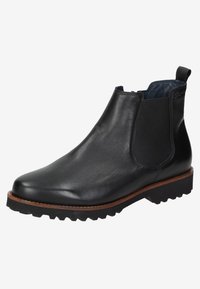 Stivale Chelsea in pelle nera con pannelli laterali elasticizzati, punta affusolata e suola in gomma testurizzata. Caratterizzato da un bordo cucito marrone attorno alla suola.
