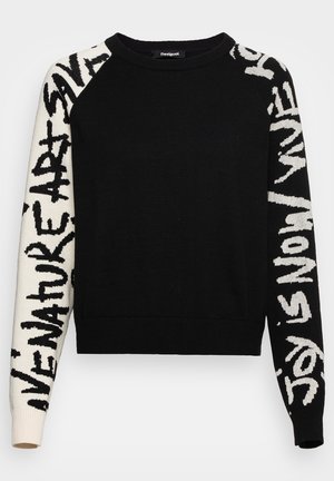 Pull noir col rond avec manches blanches comportant un texte noir en gras sur une manche et un texte blanc en gras sur l'autre manche.