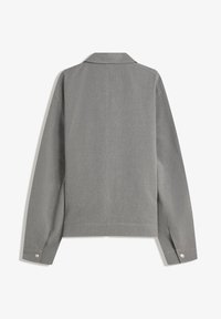 Grey long-sleeve jacket with a smooth texture, notched collar, and button cuffs. Features a structured design and minimalistic style.