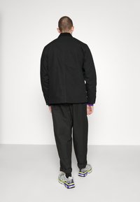 Carhartt WIP MICHIGAN COAT DEARBORN - Casaco leve - black/rigid