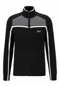 Svart zip-up jacka med vita accenter och texturerade paneler. Har en hög krage och ribbade ärmslut. BOSS-logotyp på bröstet.