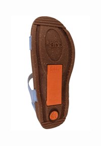 Light blue sandal sole with a brown, textured rubber base. Features orange label stating "ByeBye Suela." Recycled materials indicated.