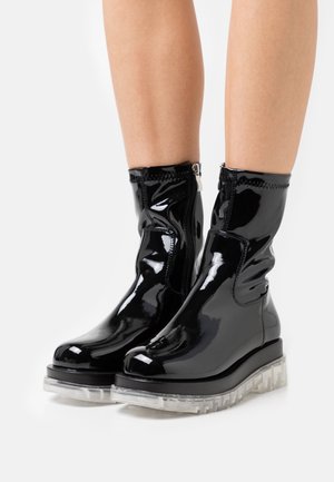 RAID Stivaletti con plateau - black