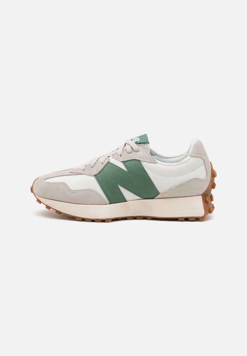 Lightweight sneaker in white with green leather accents and gray suede overlays. Features a rubber sole with textured grip and subtle design lines.