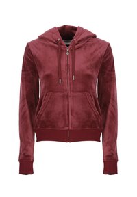 Hoodie bordeaux con zip realizzato in morbido velluto. Presenta un cappuccio, tasche frontali e polsini a coste. Dettaglio logo sottile sul petto.