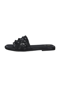 Black slide sandal with a textured upper featuring geometric studs. Smooth sole, open toe design, and minimalistic silhouette.